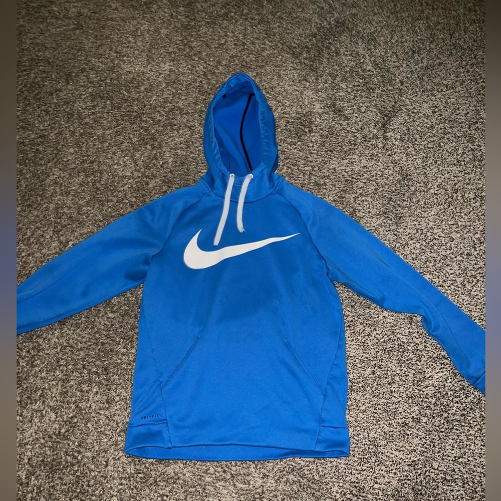 -Men's Small Nike hoodie. Hood string has flair